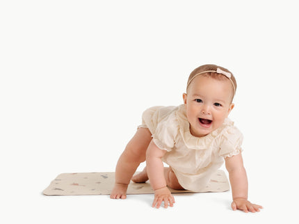Image of a baby in a mat
