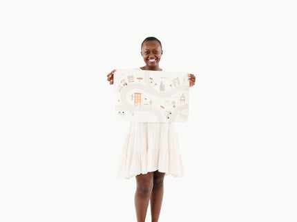 image of a woman holding a mat