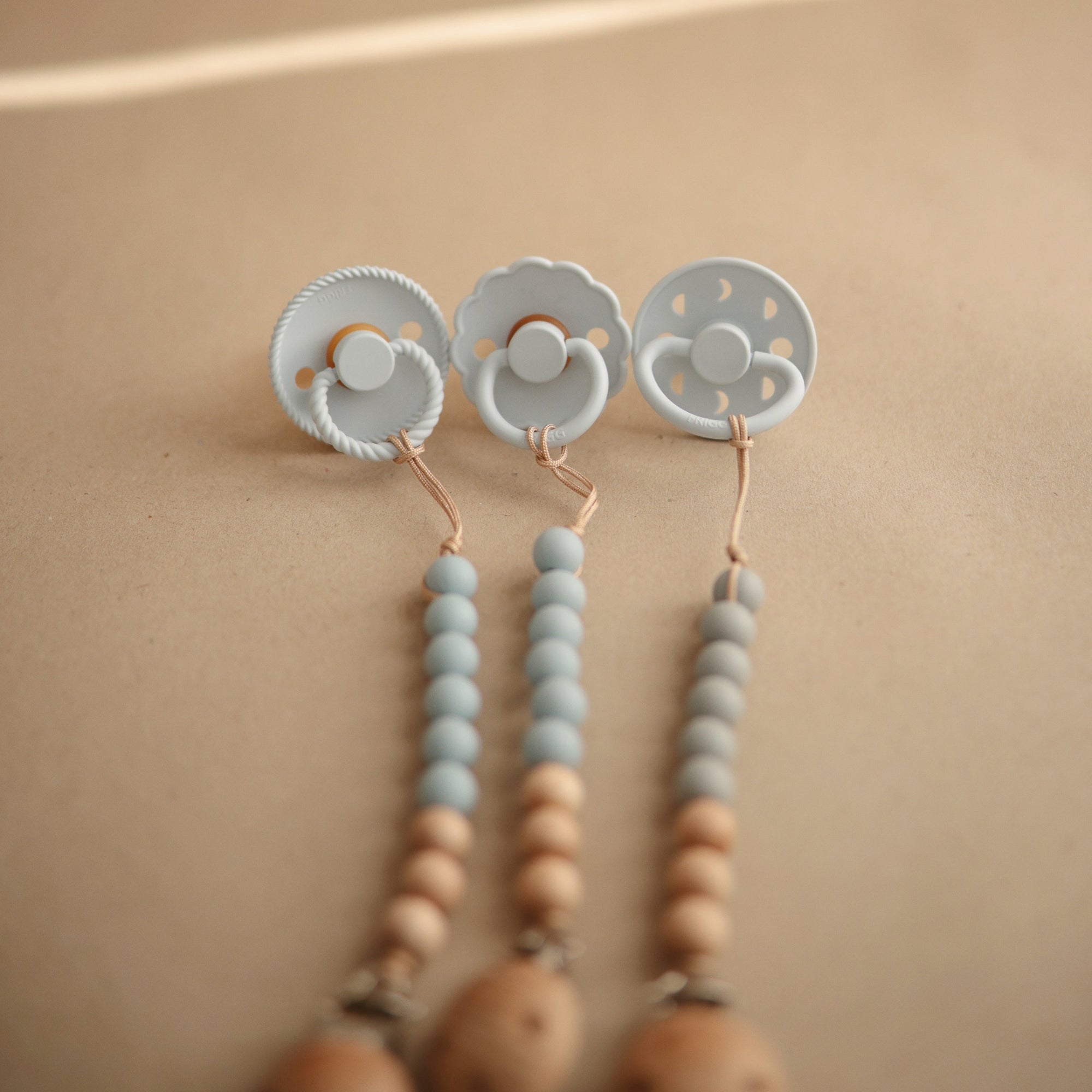 Mushie Silicone Pacifier Clip | Eva