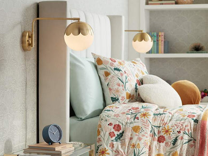 Camila 8 1/4" Brass and Glass Globe Plug-In Wall Lamp