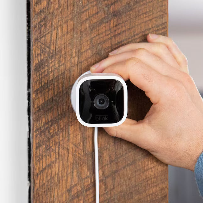 Blink Mini – Compact Indoor Plug-in Smart Security Camera, 1080p HD Video, Night Vision, Motion Detection, Two-way Audio, Easy Set Up, Works with Alexa – White
