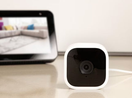 Blink Mini – Compact Indoor Plug-in Smart Security Camera, 1080p HD Video, Night Vision, Motion Detection, Two-way Audio, Easy Set Up, Works with Alexa – White