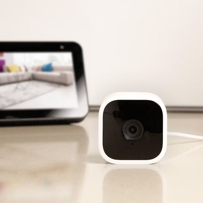 Blink Mini – Compact Indoor Plug-in Smart Security Camera, 1080p HD Video, Night Vision, Motion Detection, Two-way Audio, Easy Set Up, Works with Alexa – White