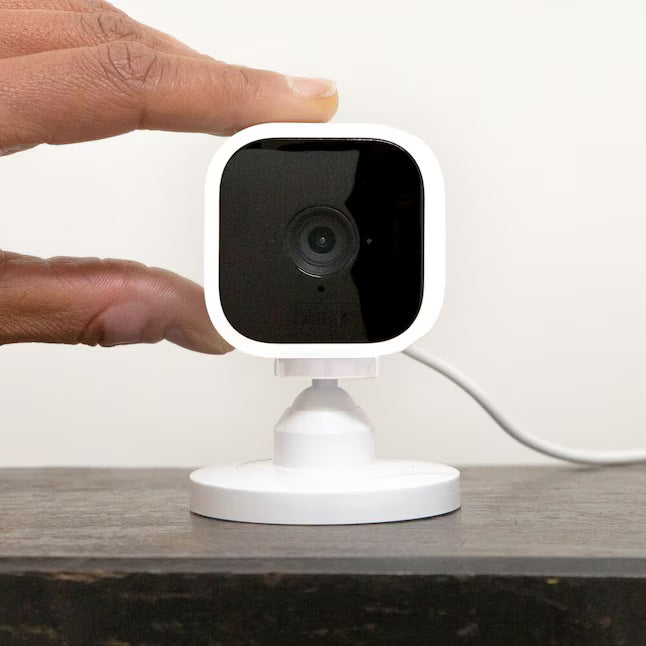 Blink Mini – Compact Indoor Plug-in Smart Security Camera, 1080p HD Video, Night Vision, Motion Detection, Two-way Audio, Easy Set Up, Works with Alexa – White