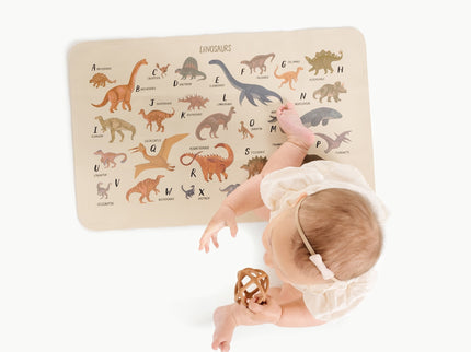 Image of a baby in a padded mat