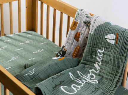 T27135,Babyletto,Ocean Waves Muslin Crib Sheet in GOTS Certified Organic Cotton