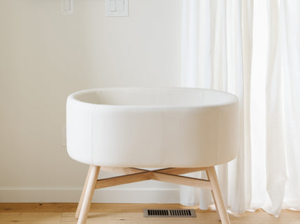 M26834GYLB,Babyletto,babyletto x GATHRE Capsule Bassinet in Ivory