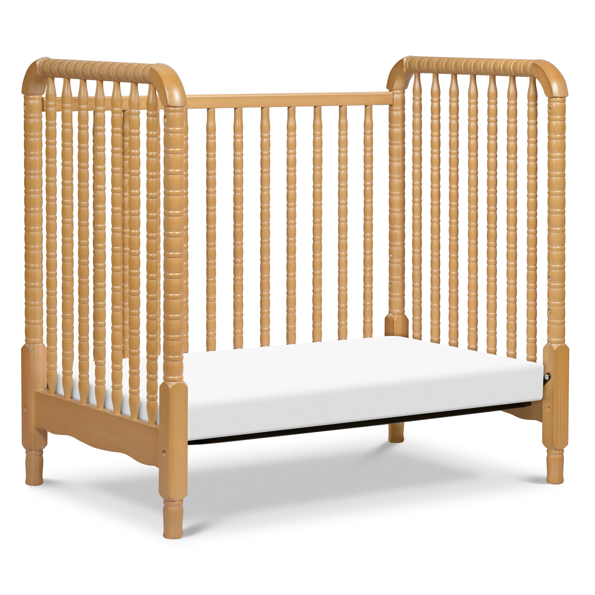 M7398HY,DaVinci,Jenny Lind 3-in-1 Convertible Mini Crib in Honey