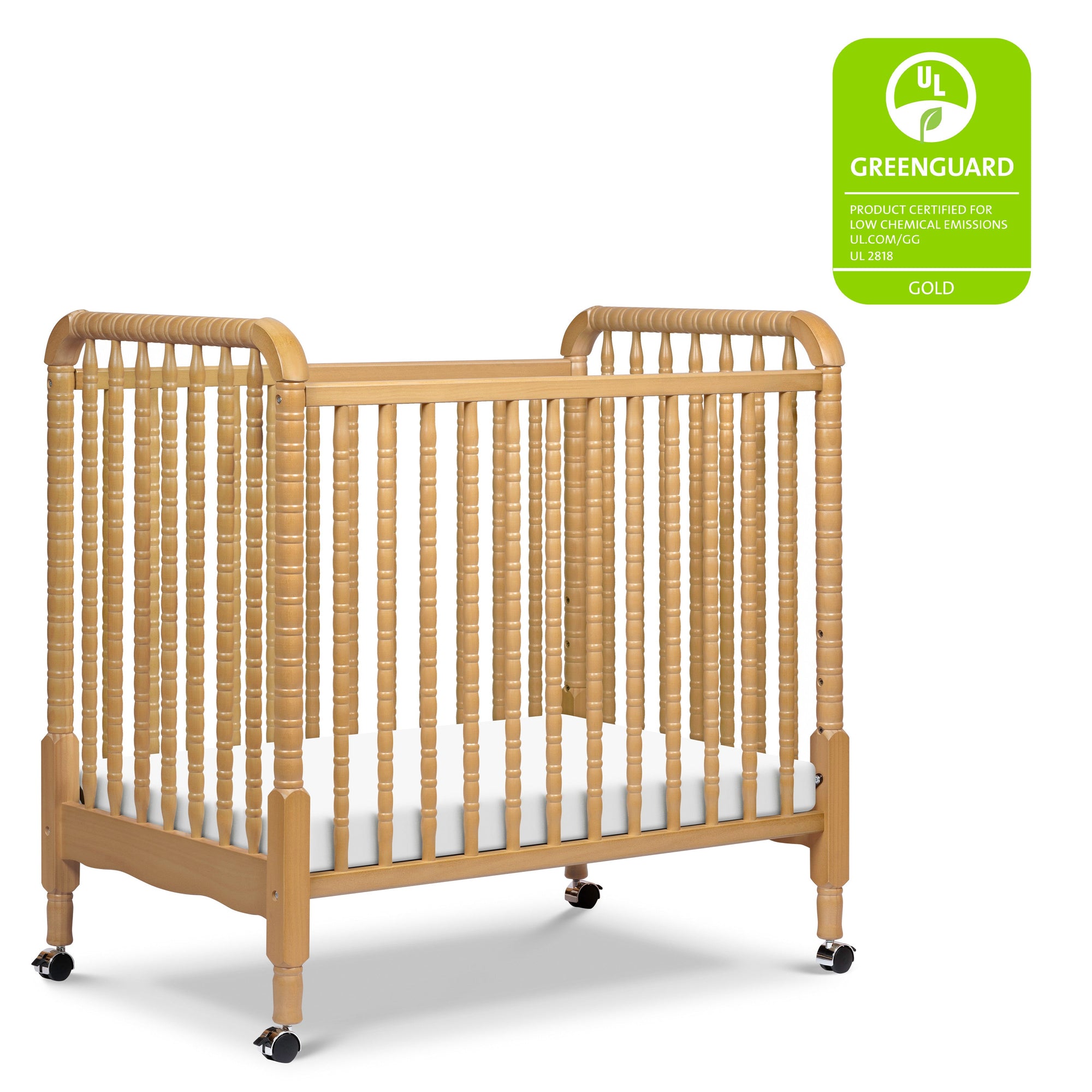 M7398HY,DaVinci,Jenny Lind 3-in-1 Convertible Mini Crib in Honey