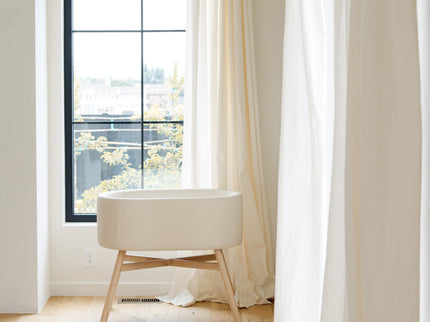 M26834GYLB,Babyletto,babyletto x GATHRE Capsule Bassinet in Ivory